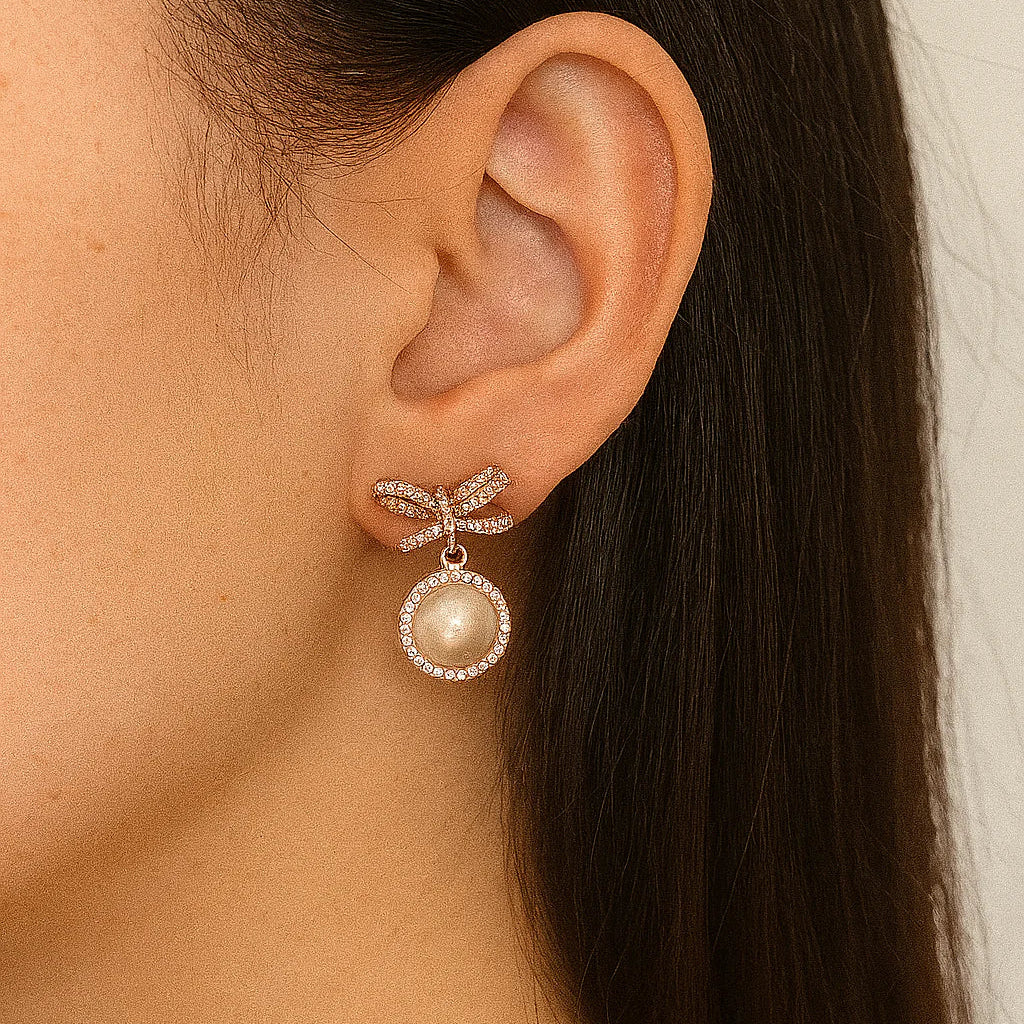 Twisted Bow With Rose Gold Touch Earrings